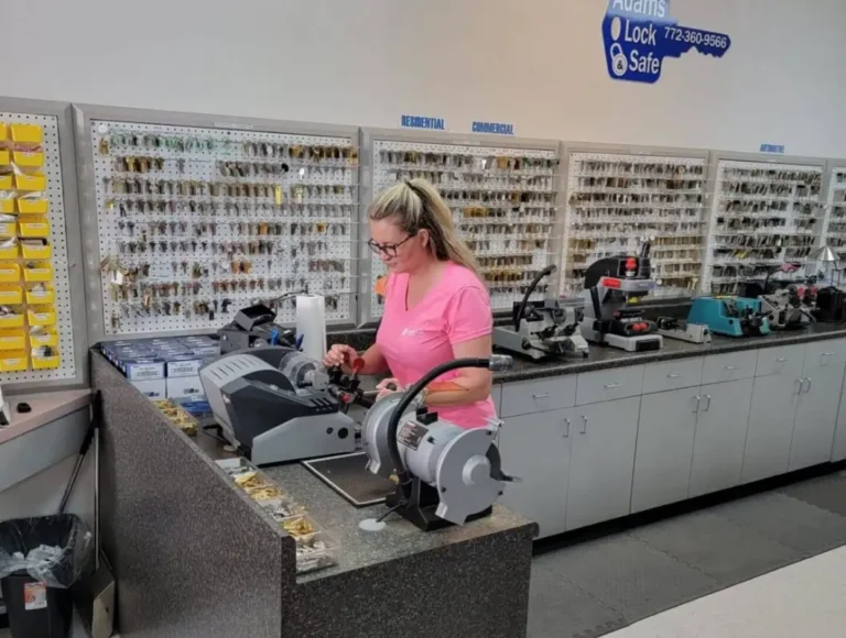 Adams Treasure Coast Lock & Safe shop interior with employee at counter